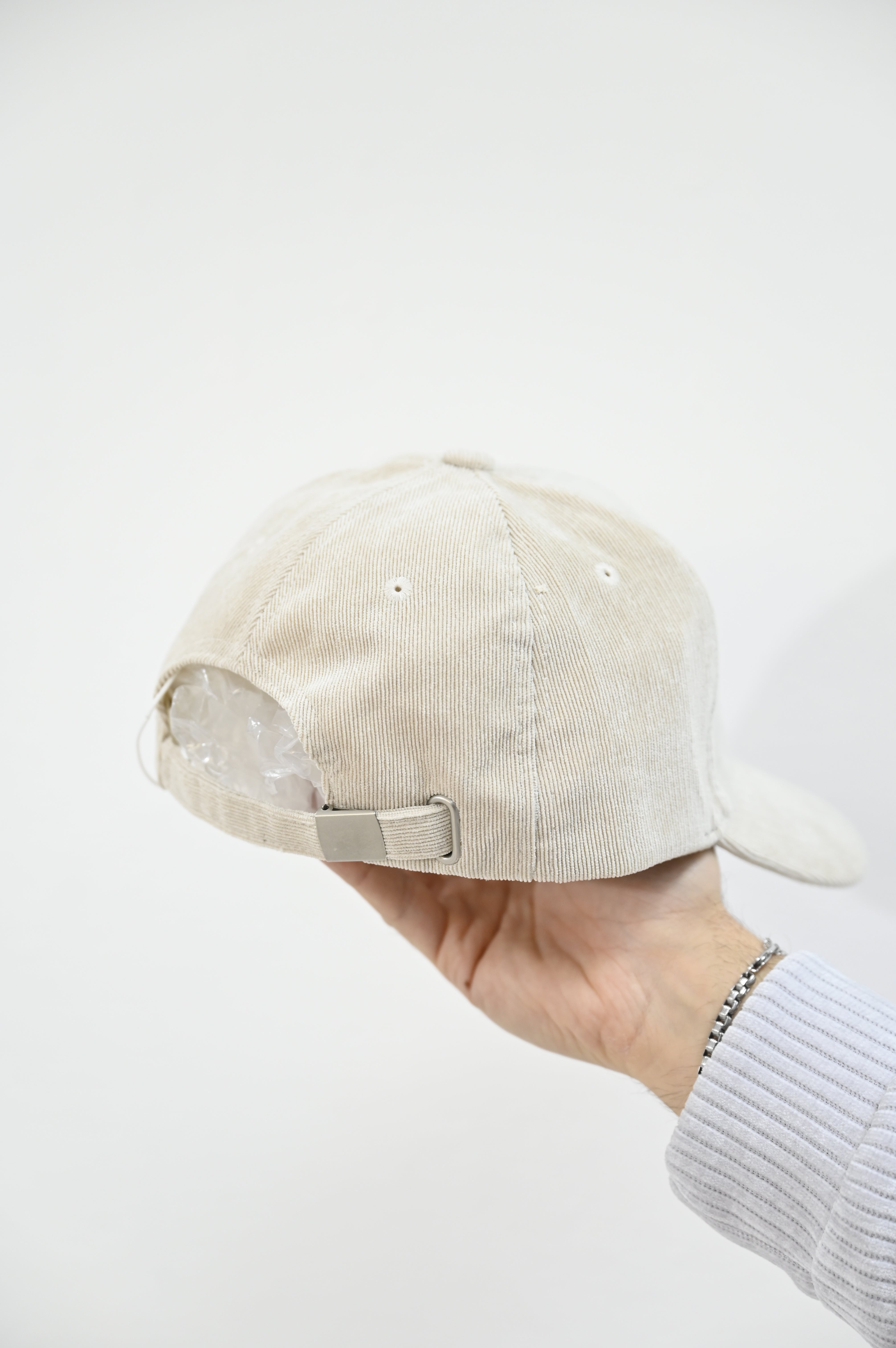 Cappellino a costine crema