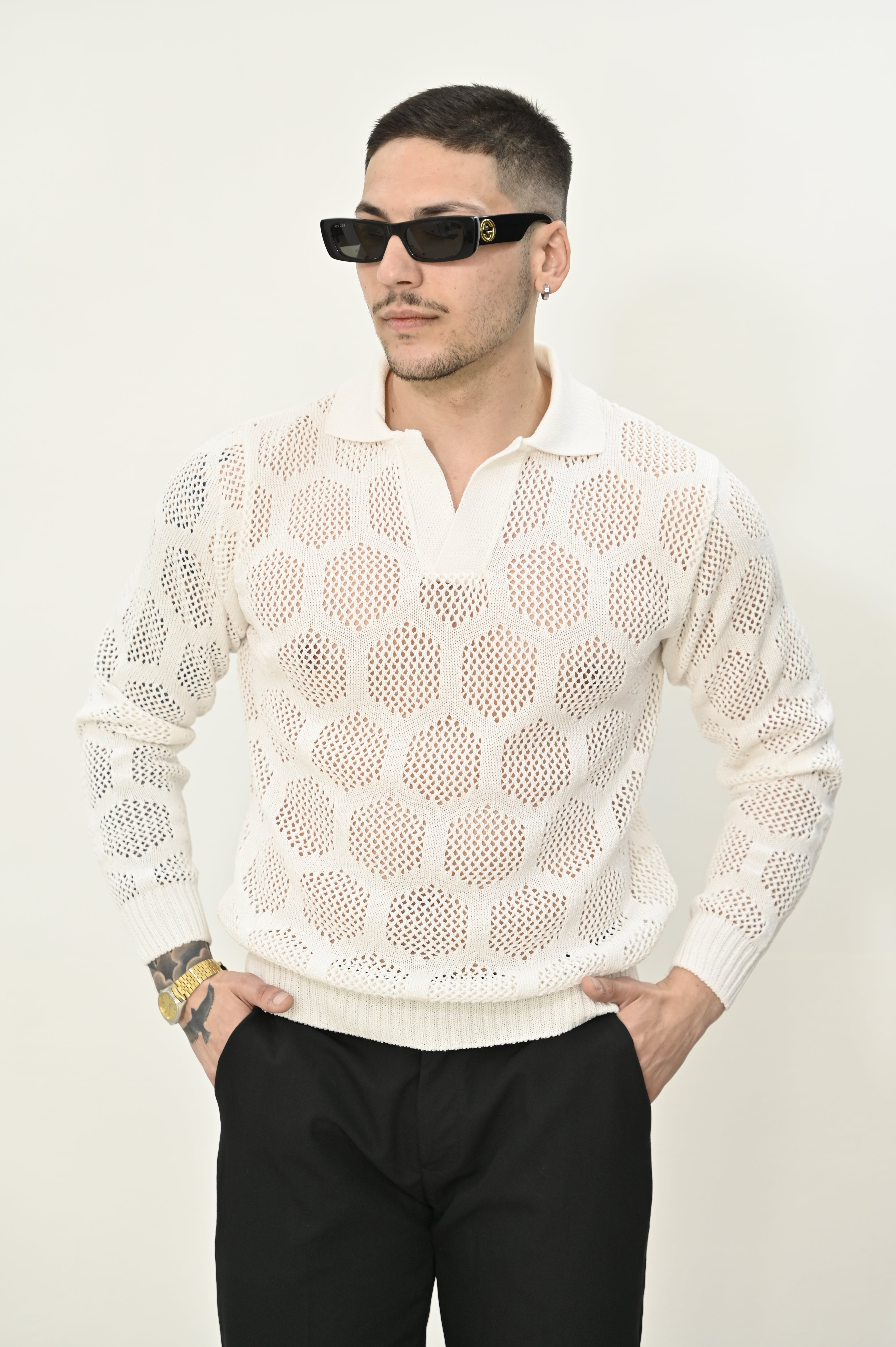 Polo traforata bianca