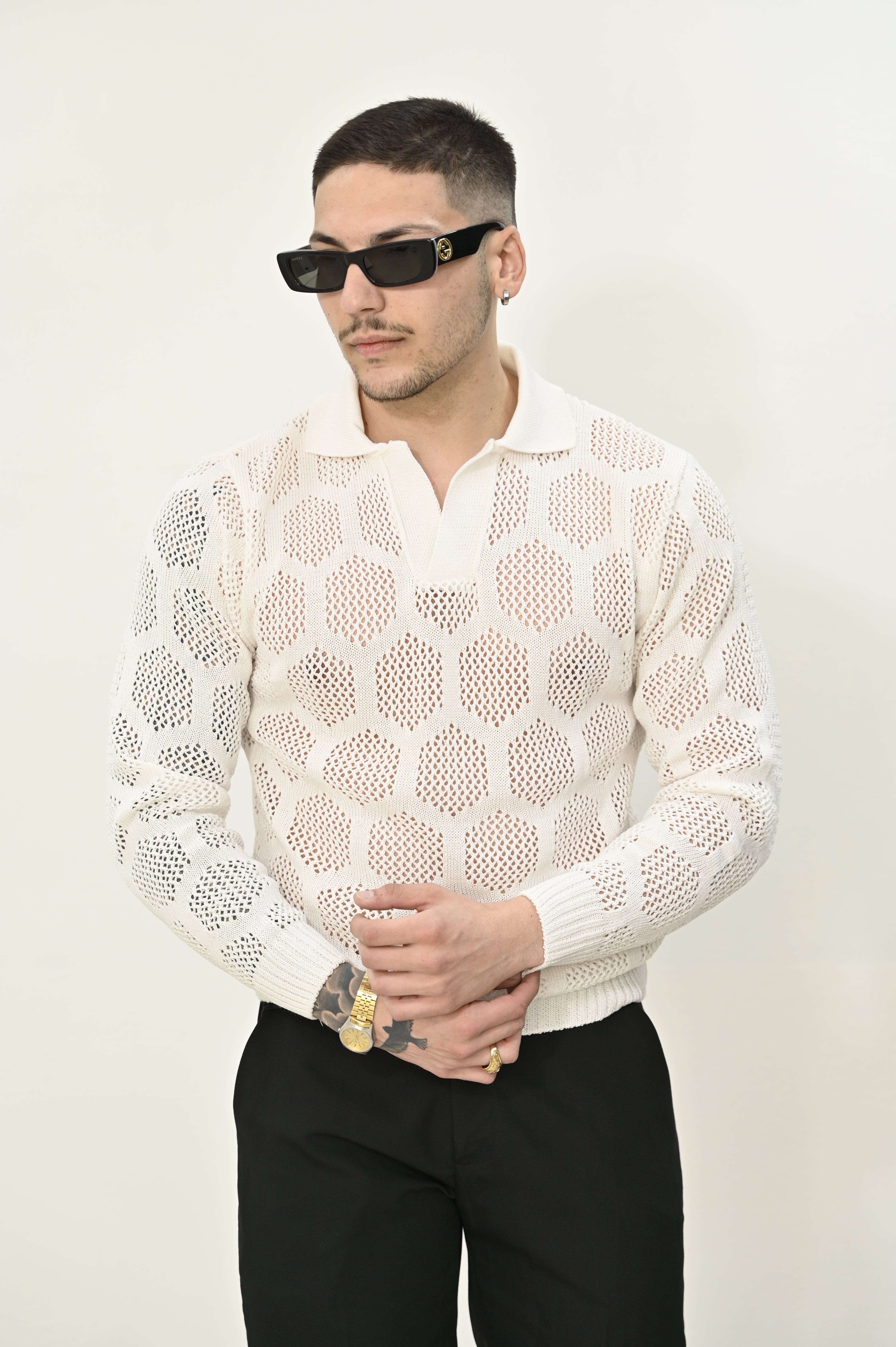 Polo traforata bianca