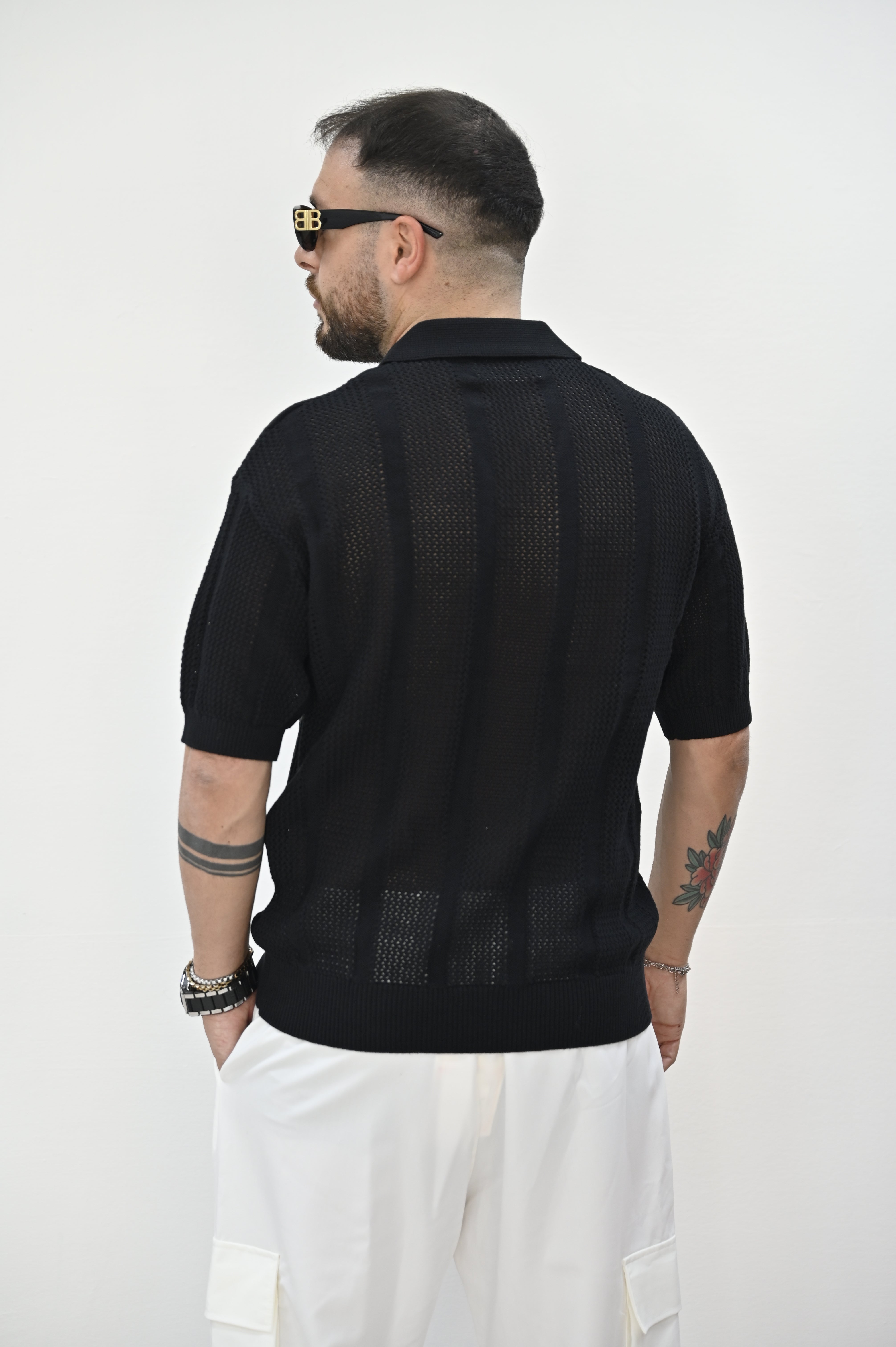 Polo ricamata nera