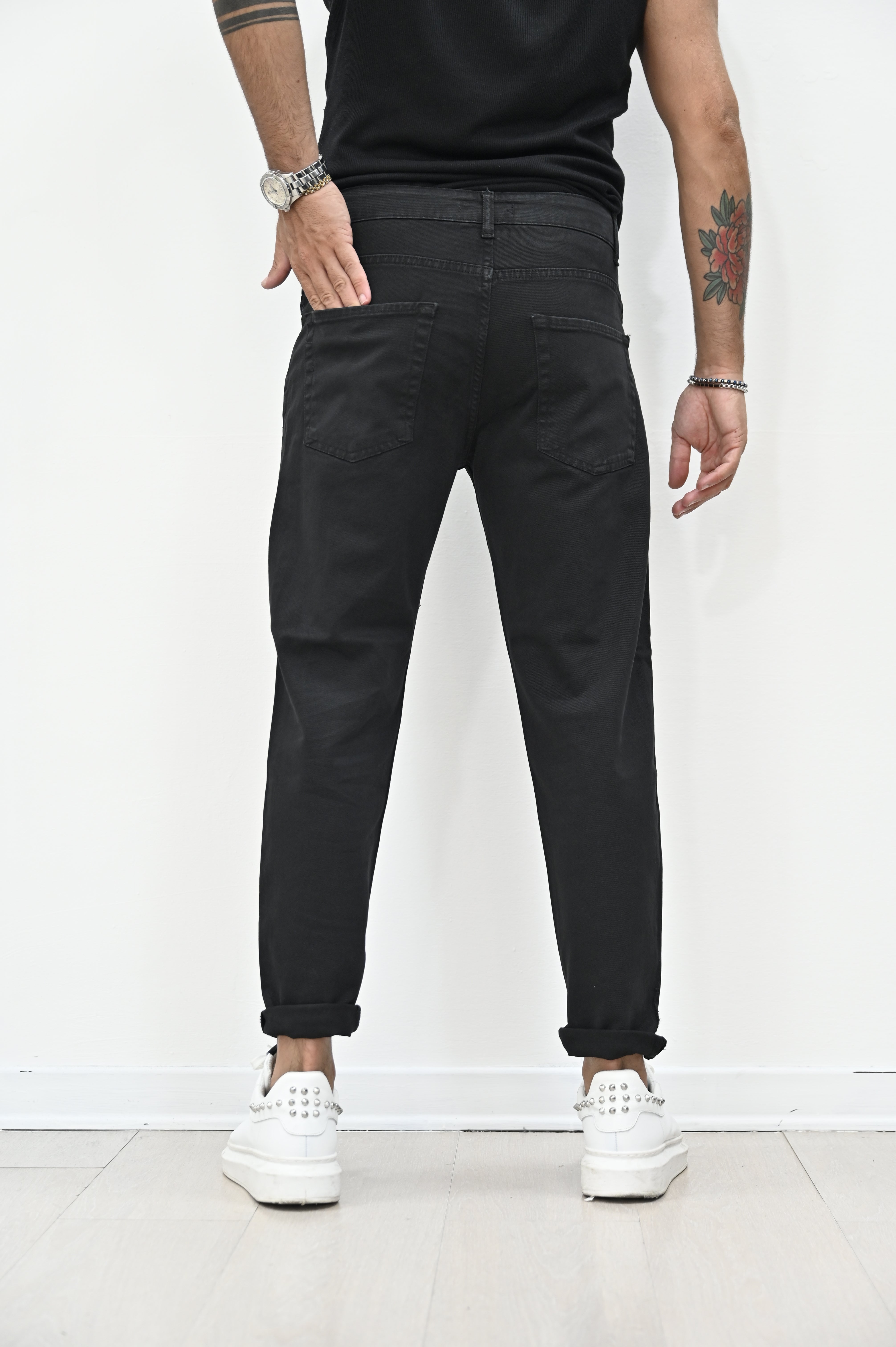 Jeans carrot con rotture