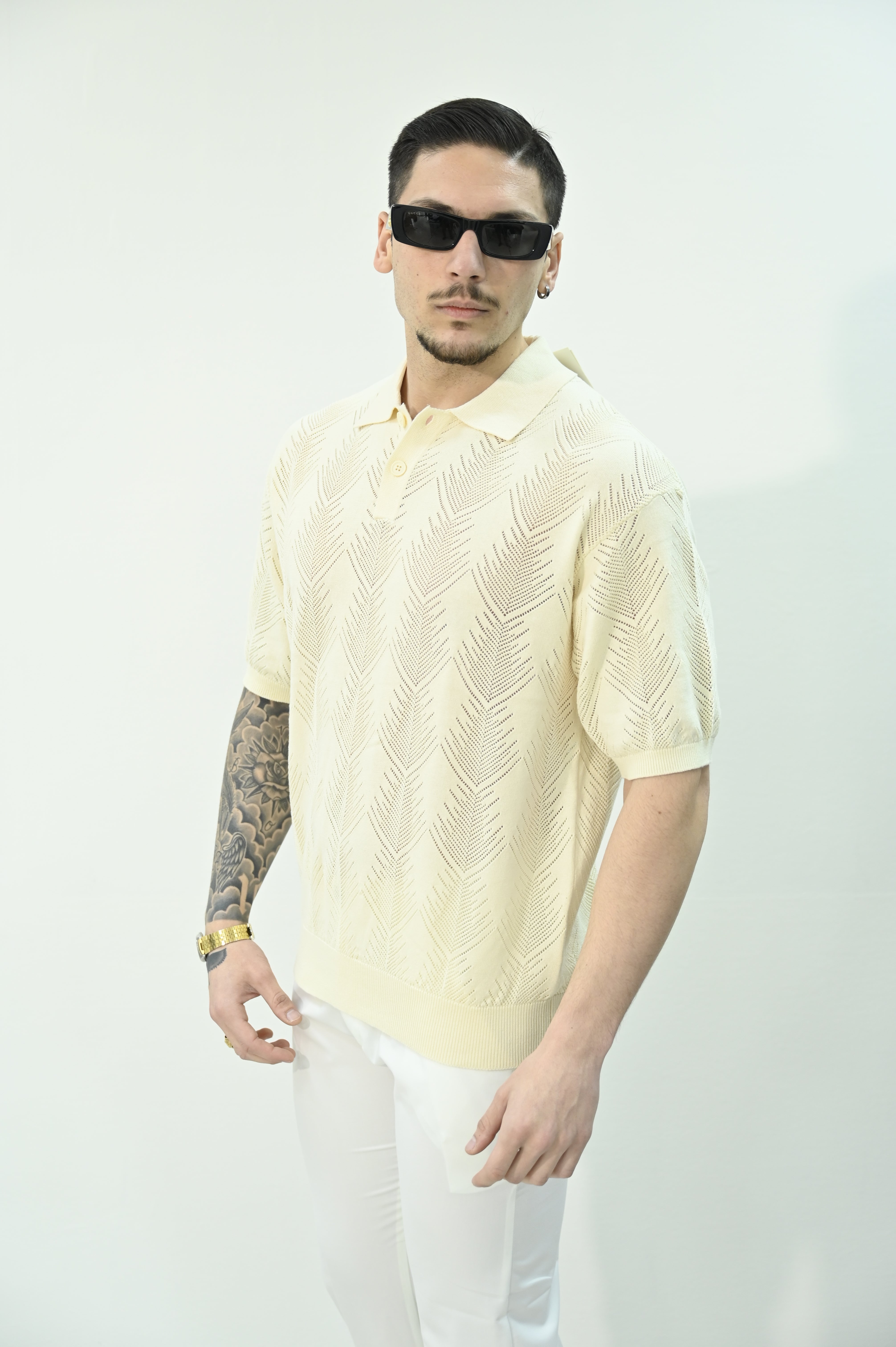 Polo traforata bianca