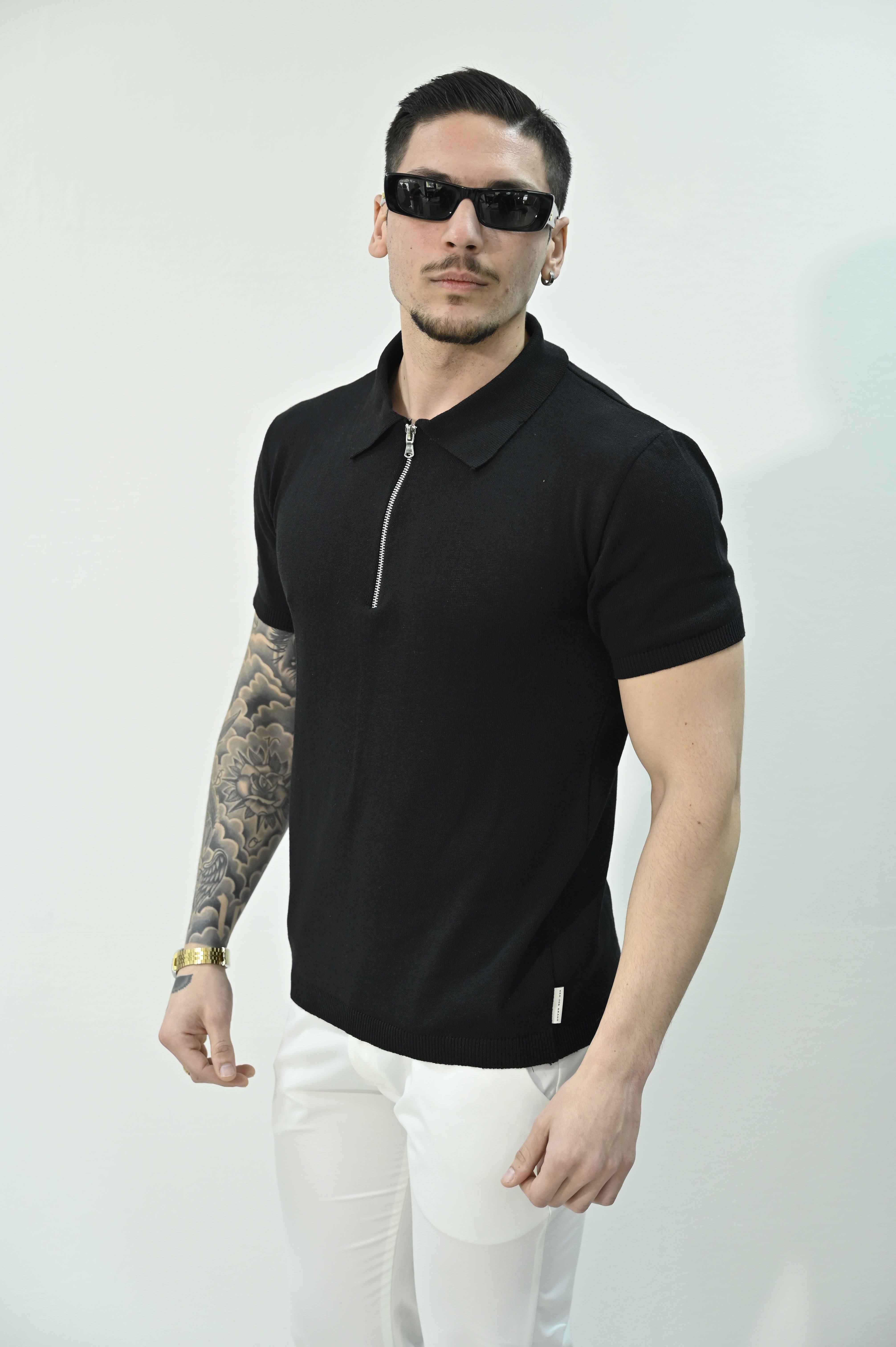 Polo con zip nera NJB