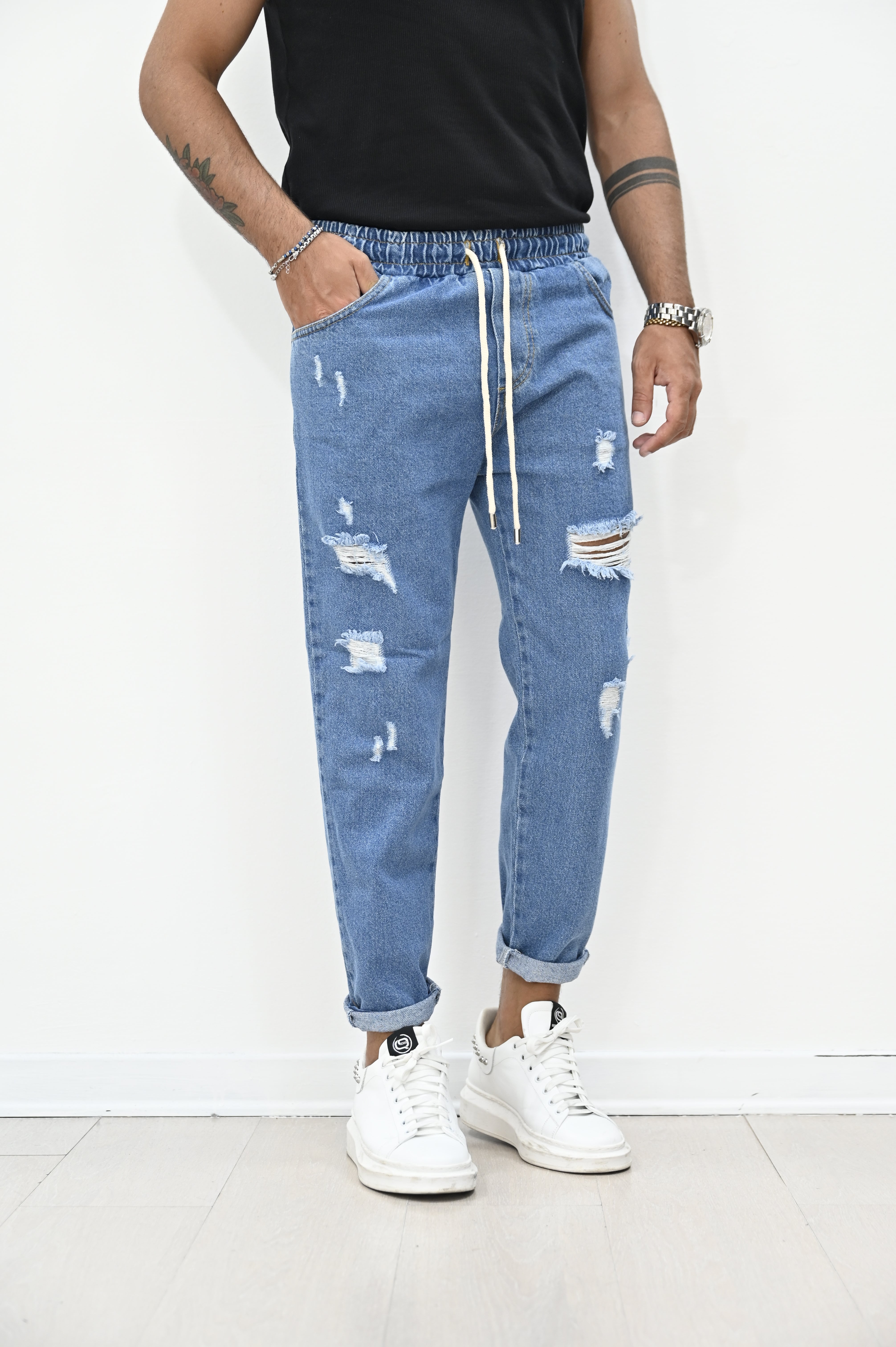 Jeans jogger blue con rotture