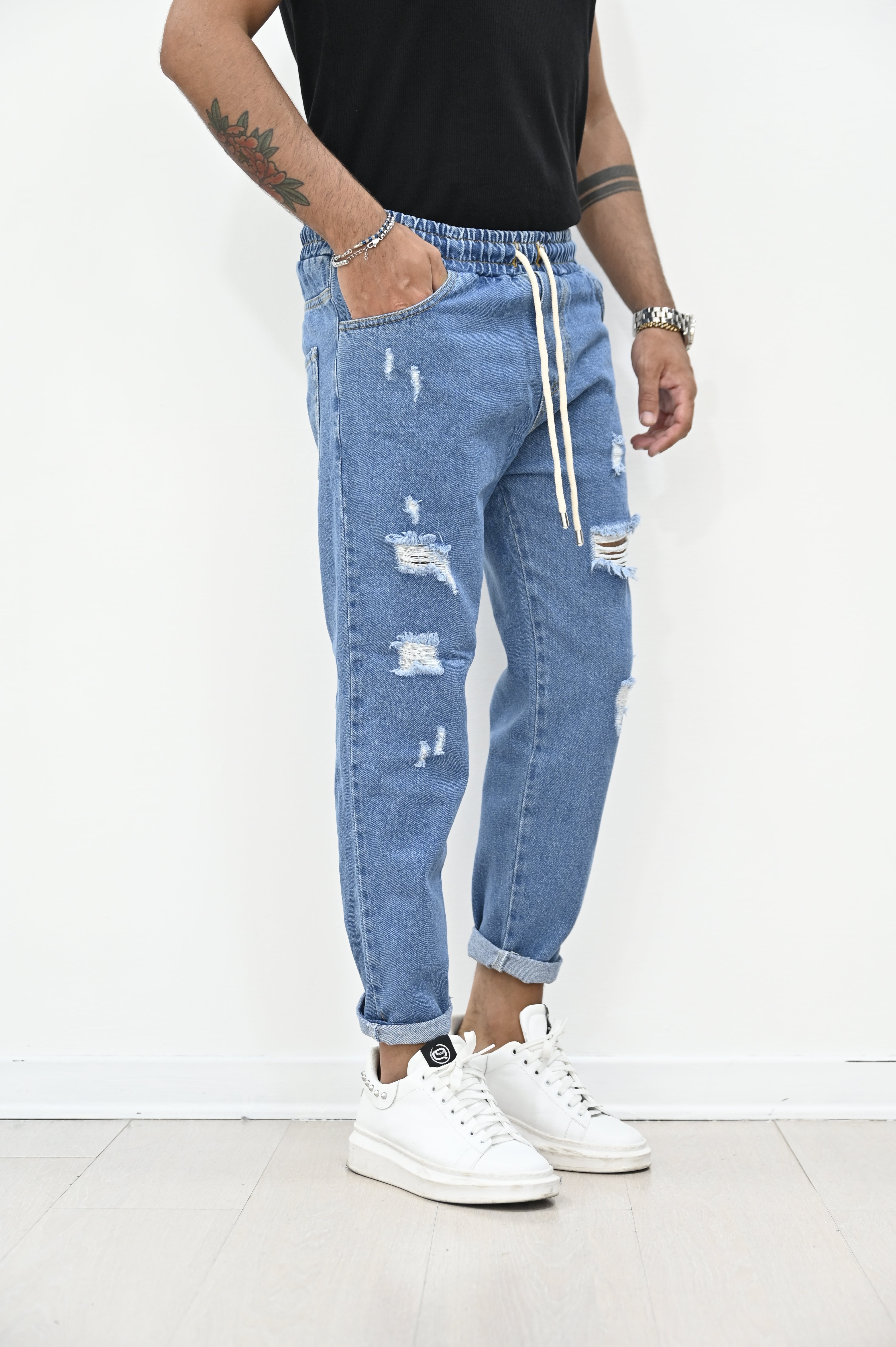 Jeans jogger blue con rotture