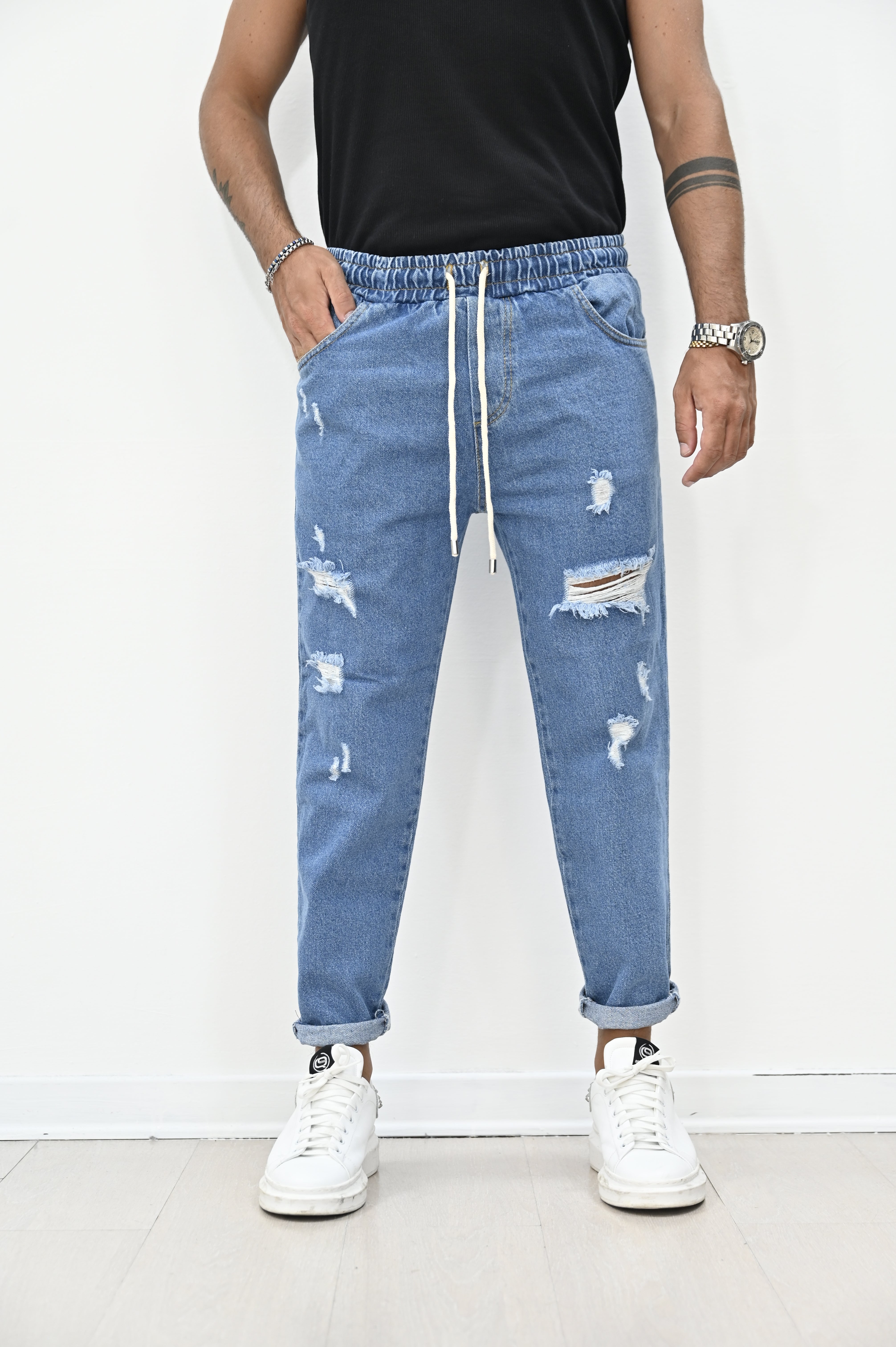 Jeans jogger blue con rotture